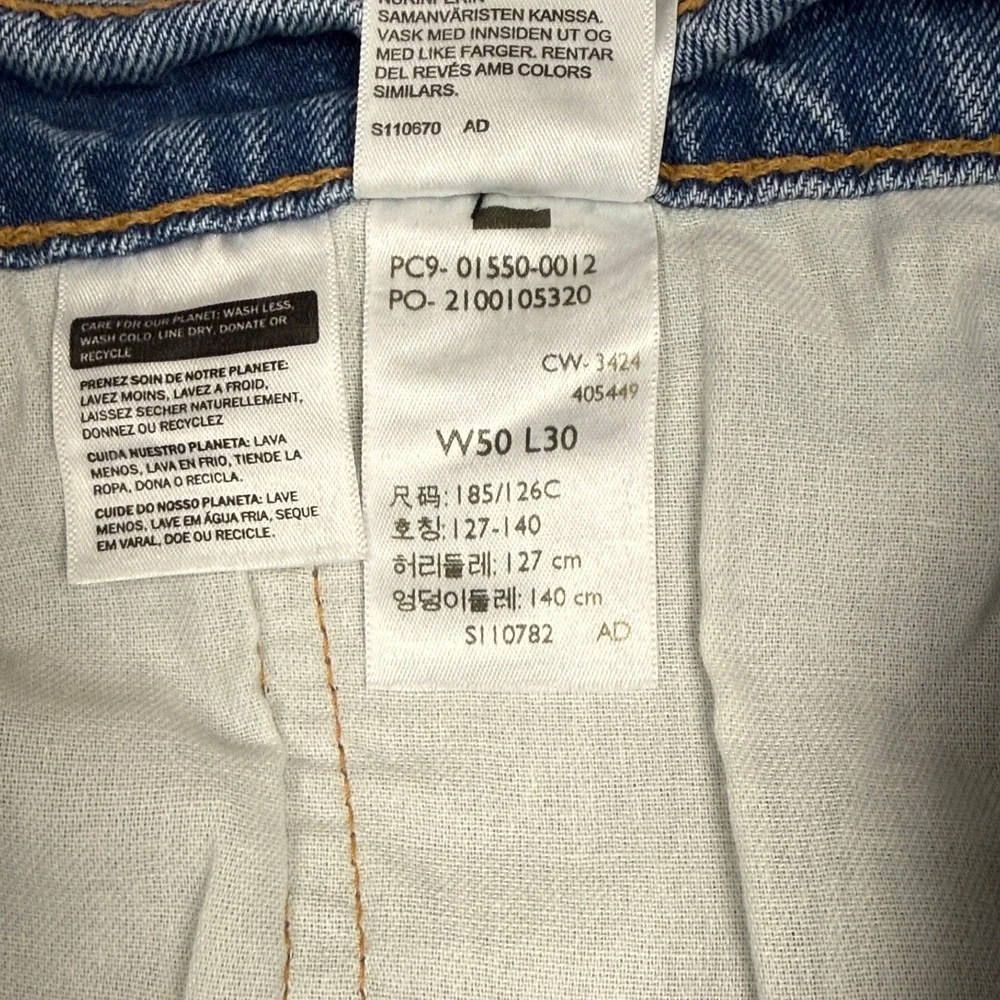 Levi's 550 Relaxed Fit Jeans Men's W50 L30 Light Wash Blue Tapered Stretch Denim